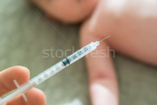 Doctor Vaccinating Baby Stock photo © AndreyPopov