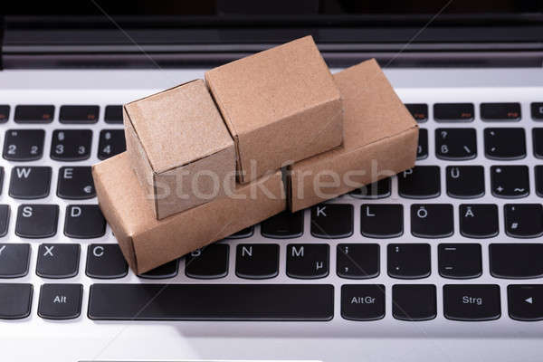 Cardboard Boxes On Laptop Keypad Stock photo © AndreyPopov