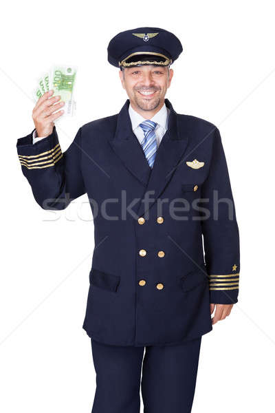 Portrait Of Happy Pilot Holding Euros Stock photo © AndreyPopov