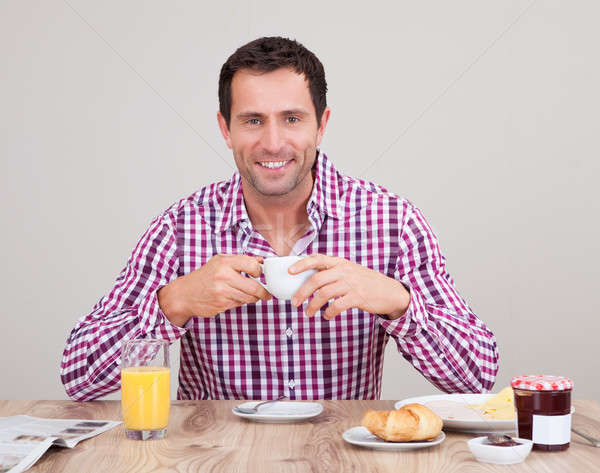 Retrato joven desayuno sonrisa modelo Foto stock © AndreyPopov