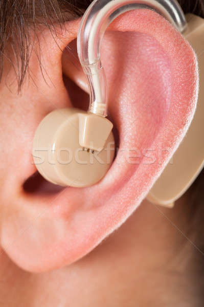 Ear With Hearing Aid Stock photo © AndreyPopov