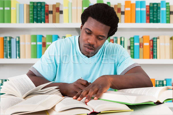 Stock photo: University Student Studying In Library
