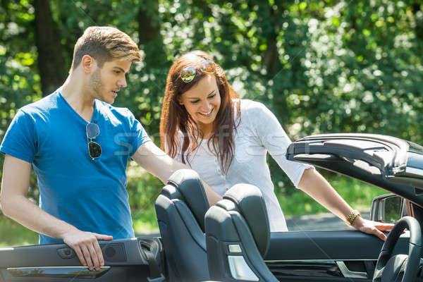 Couple Looking At Their Newly Purchased Car Stock photo © AndreyPopov