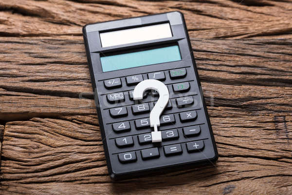 Közelkép kérdőjel számológép fa fa asztal kérdés Stock fotó © AndreyPopov