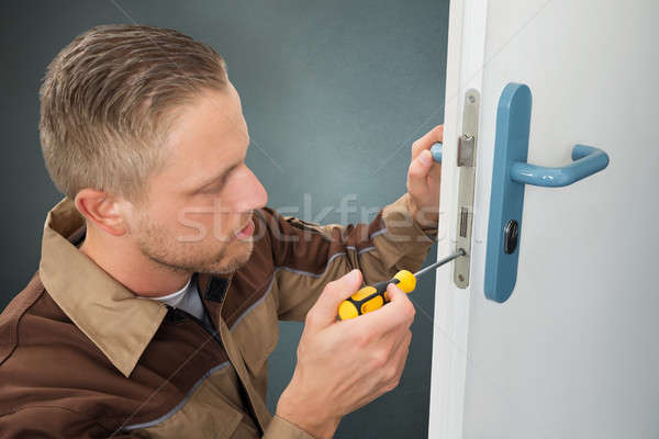 Handyman Repair The Door Lock Stock photo © AndreyPopov