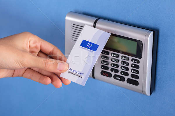 Person Holding Key Card Near Security System Stock photo © AndreyPopov