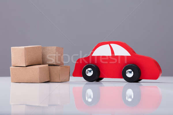 Rood auto karton dozen witte bureau Stockfoto © AndreyPopov