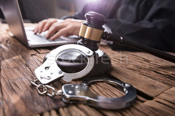 Close-up Of Handcuffs And Gavel In Courtroom Stock photo © AndreyPopov