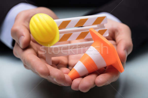 Close-up Of Barricade With Traffic Cone And Hard Hat Stock photo © AndreyPopov