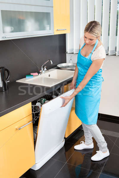 Woman Closing Dishwasher Stock photo © AndreyPopov