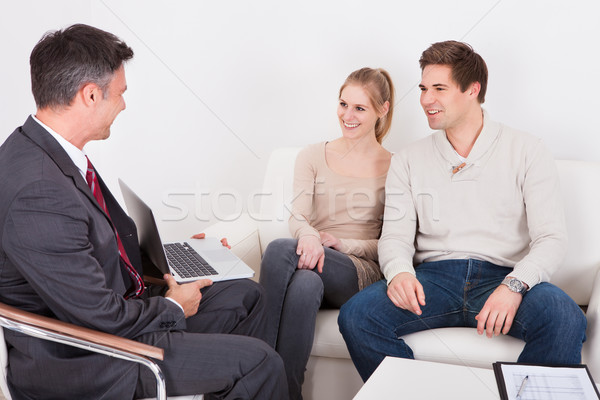 Consultant Advising Young Couple Stock photo © AndreyPopov