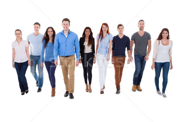 Diverse group of people walking towards camera Stock photo © AndreyPopov