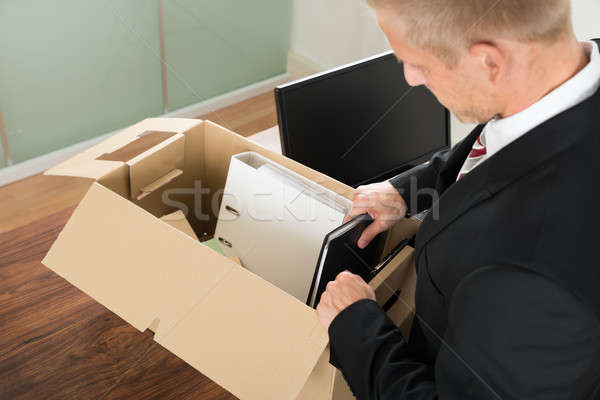 Om de afaceri fişiere cutie de carton birou Imagine de stoc © AndreyPopov