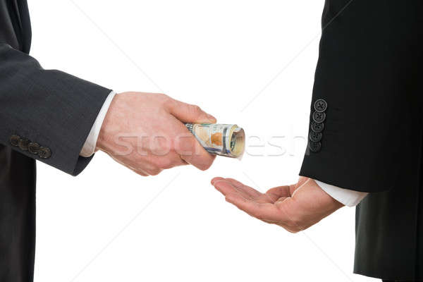 Businessman Taking Bribe Stock photo © AndreyPopov