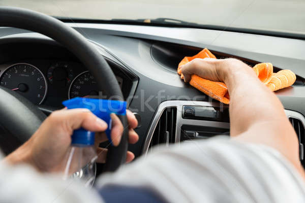 Male Worker Cleaning Car Dashboard Stock photo © AndreyPopov