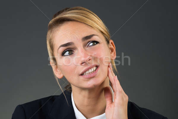 Stock photo: Businesswoman Suffering From Tooth Ache