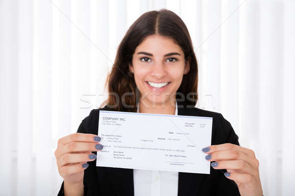 Successful Businesswoman Showing Cheque Stock photo © AndreyPopov