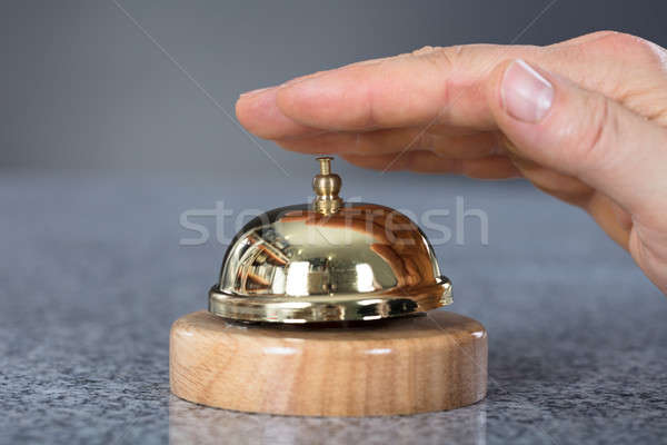 Person Hand Ringing Service Bell Stock photo © AndreyPopov