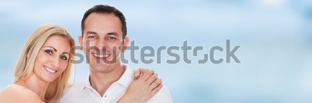 Portrait Of Happy Couple With One Child Stock photo © AndreyPopov