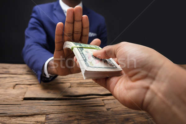 Businessman Refusing To Take Bribe From Partner Stock photo © AndreyPopov