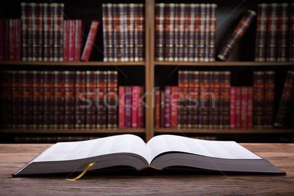 Közelkép nyitva törvény könyv fából készült asztal Stock fotó © AndreyPopov