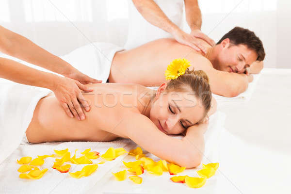 Attractive couple having a massage Stock photo © AndreyPopov