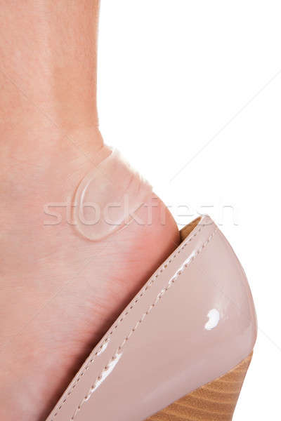 Sticky bandage on woman heel Stock photo © AndreyPopov