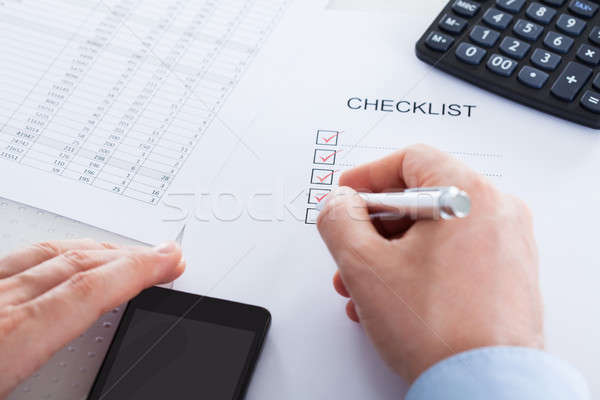 Stock photo: Hand With Pen Over Application Form