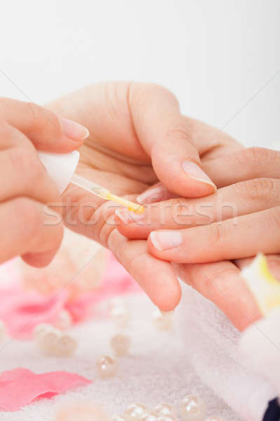 Manicurist Applying Nail Varnish Stock photo © AndreyPopov