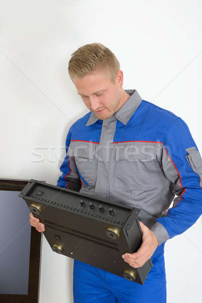 Technician Holding Amplifier Stock photo © AndreyPopov