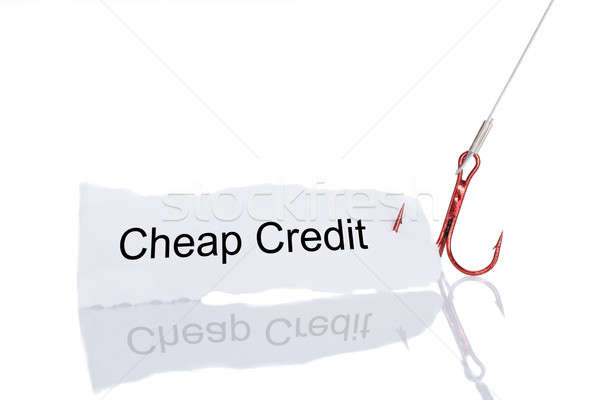 Cheap Credit Paper Trapped In Fishhook Stock photo © AndreyPopov