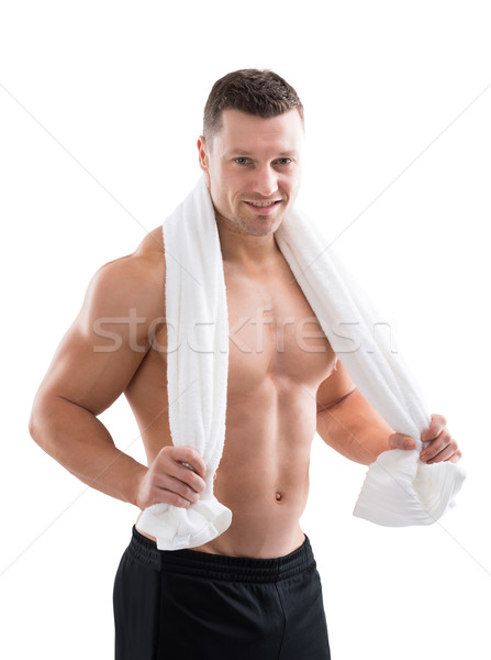 Stock photo: Strong Man Holding Towel Around Neck