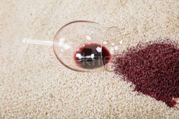 Red Wine Spilled From Glass On Carpet Stock photo © AndreyPopov