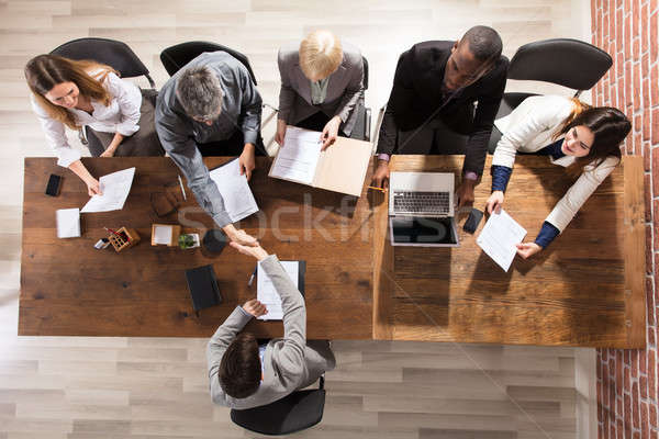 Stock photo: Businesspeople Shaking Hands In Meeting