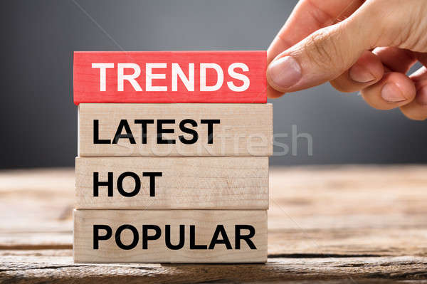 Stock photo: Hand Building Trends Concept With Wooden Blocks