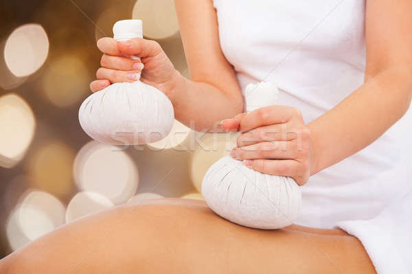 Client Getting Massage With Herbal Compress Balls Stock photo © AndreyPopov