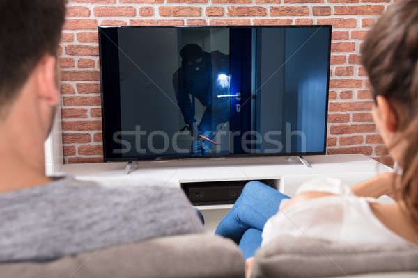 Pár néz film otthon hátsó nézet ül Stock fotó © AndreyPopov