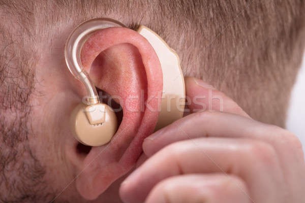 Férfi visel hallókészülék közelkép gyógyszer segítség Stock fotó © AndreyPopov