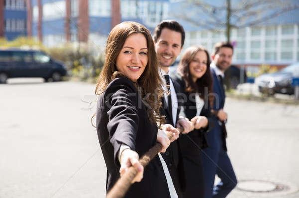 Businesspeople Playing Tug Of War Stock photo © AndreyPopov