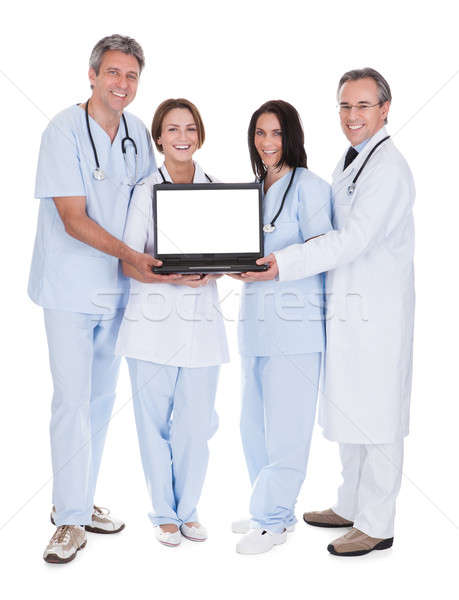 Group Of Doctors With A Laptop Stock photo © AndreyPopov