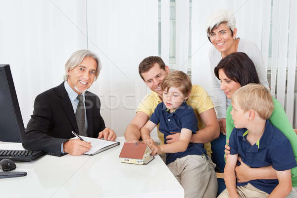 Family in real-estate agency Stock photo © AndreyPopov