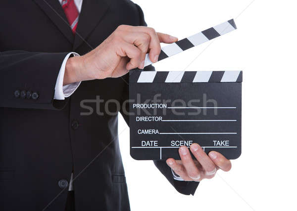 Close-up Of Man Holding Clapperboard Stock photo © AndreyPopov