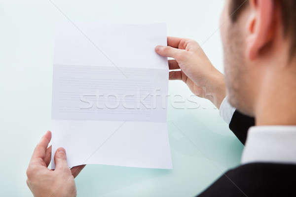 Person's Hand Holding Blank Paper Stock photo © AndreyPopov