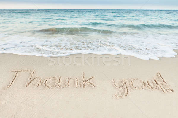 Thank You Written On Sand By Sea Stock photo © AndreyPopov