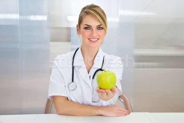Dietician Holding Green Apple Stock photo © AndreyPopov