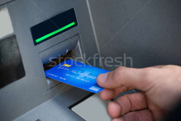 Kéz bankautomata kártya üzlet pénz papír Stock fotó © AndreyPopov