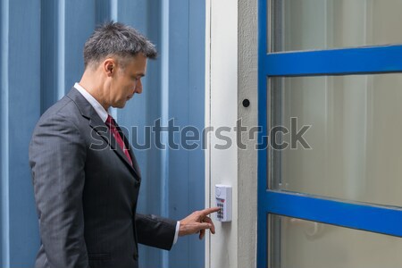 Man Inserting Ticket To Pay For Parking Stock photo © AndreyPopov