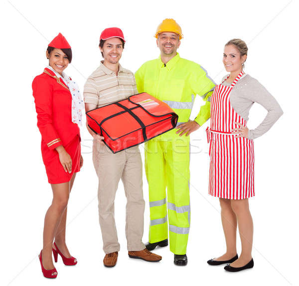 Foto stock: Diverso · grupo · sorridente · trabalhadores · isolado · branco