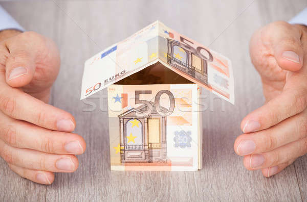 Kezek Euro ház közelkép asztal üzlet Stock fotó © AndreyPopov