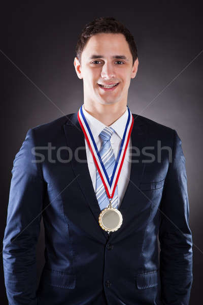 Fericit om de afaceri medalie portret negru Imagine de stoc © AndreyPopov